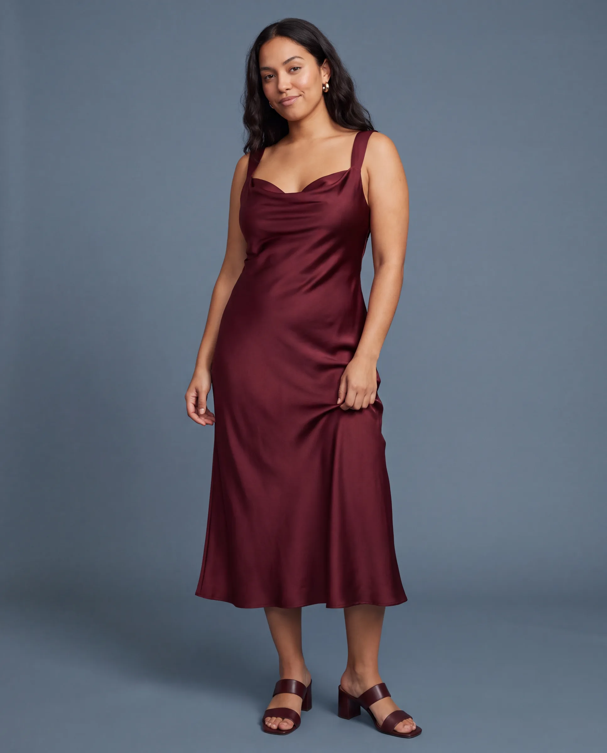 Woman wearing a dress in a studio